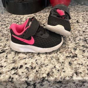 Black and pink size 3 Nikes